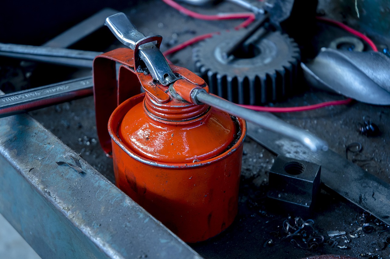 industrial, machine oil, oiling, lubrication, lubricating oil, red, contrast, friction, metal, oil, reducing friction, dispenser, blue metal, machine oil, lubrication, friction, friction, friction, friction, friction